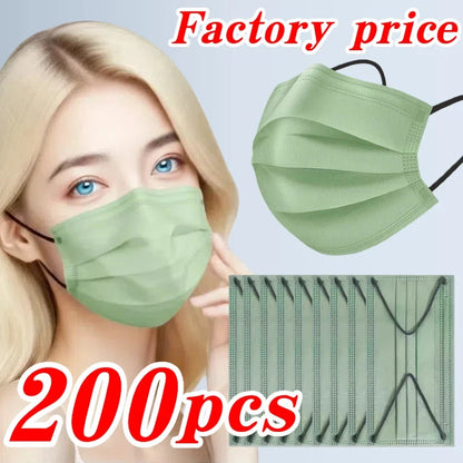 Set of 200 thickened tea green disposable face masks with elastic loops and adjustable nose clips, suitable for travel and outdoor activities