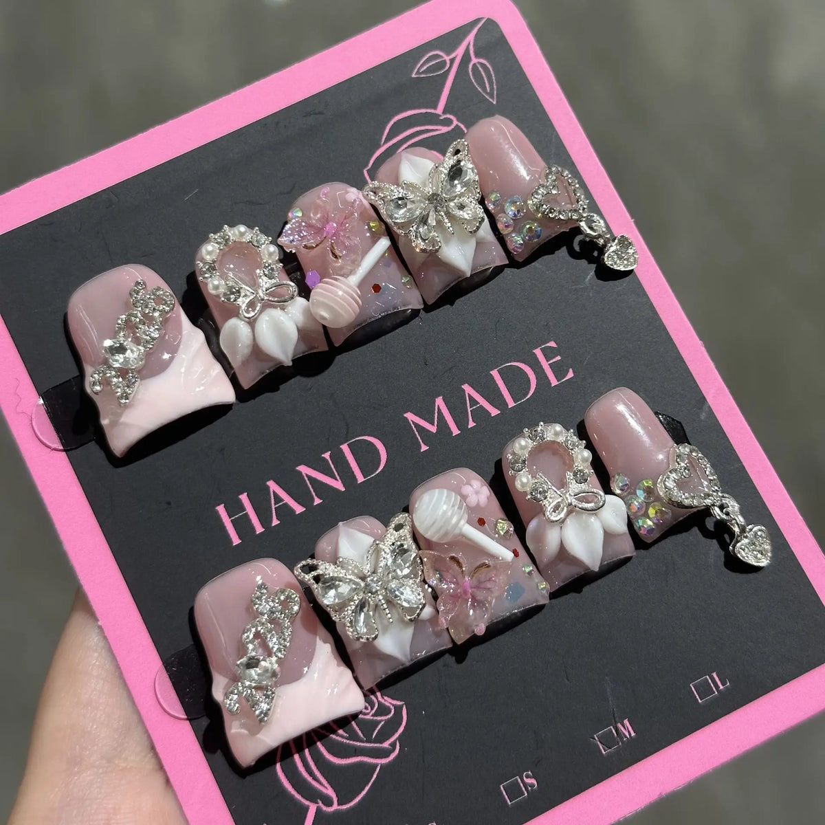 Set of 10 Ocean Style Fake Nails by Blushimmer featuring duck bill shape, 3D flowers, pearl accents, gradient blush, and French design.