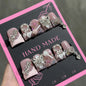 Set of 10 Ocean Style Fake Nails by Blushimmer featuring duck bill shape, 3D flowers, pearl accents, gradient blush, and French design.
