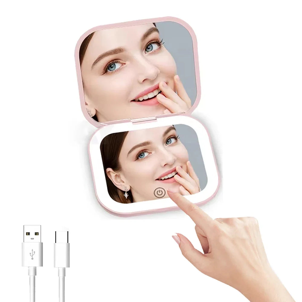 Blushimmer 2X magnifying compact vanity makeup mirror with LED lights, portable folding design, handheld for travel and grooming.