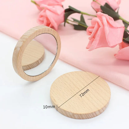 Portable round wooden cosmetic mirror by Blushimmer, compact travel mirror for beauty and grooming on the go.