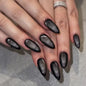 Set of 24 glossy red cat's eye press-on nails by Blushimmer, almond-shaped full cover false nails with nude and charm details