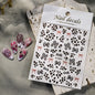 Pink leopard print nail art stickers by Blushimmer, featuring 8x10cm pink, black, and brown leopard decals for DIY manicure design.