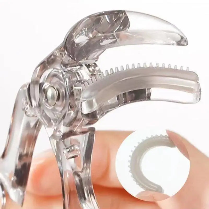 Blushimmer frameless eyelash curler with toothed comb for professional curling, portable wide-angle lash clip, close-up view