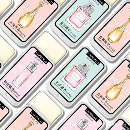 Blushimmer woman pheromone perfume solid balm in a portable, long-lasting fragrance container, showing the light perfume balm inside.