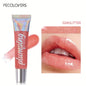 Blushimmer glitter lip gloss tube with moisturizing fruit lip oil, clear fullness tint, soft applicator for smooth lip makeup.