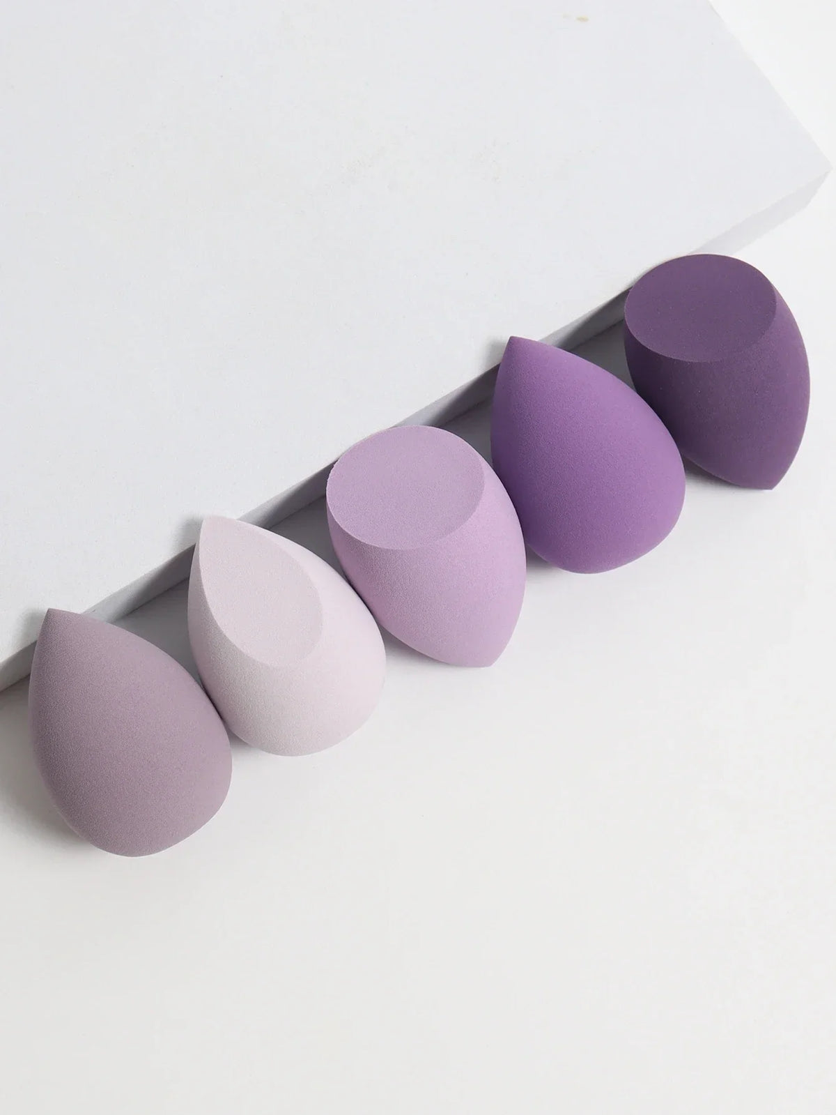 Set of five Blushimmer vegan velvet makeup sponges for liquid, cream, and powder makeup application, eco-friendly travel essentials.