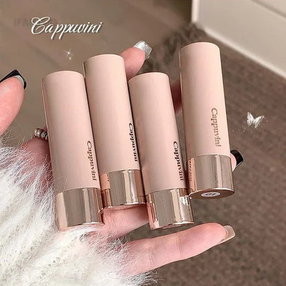 Gray and brown bronzer contouring stick by Blushimmer, waterproof cream face concealer and shadow makeup tool.