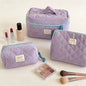 Pink Blushimmer Airfriend makeup bag with soft fabric and cute design, ideal for travel cosmetics and toiletry organization.