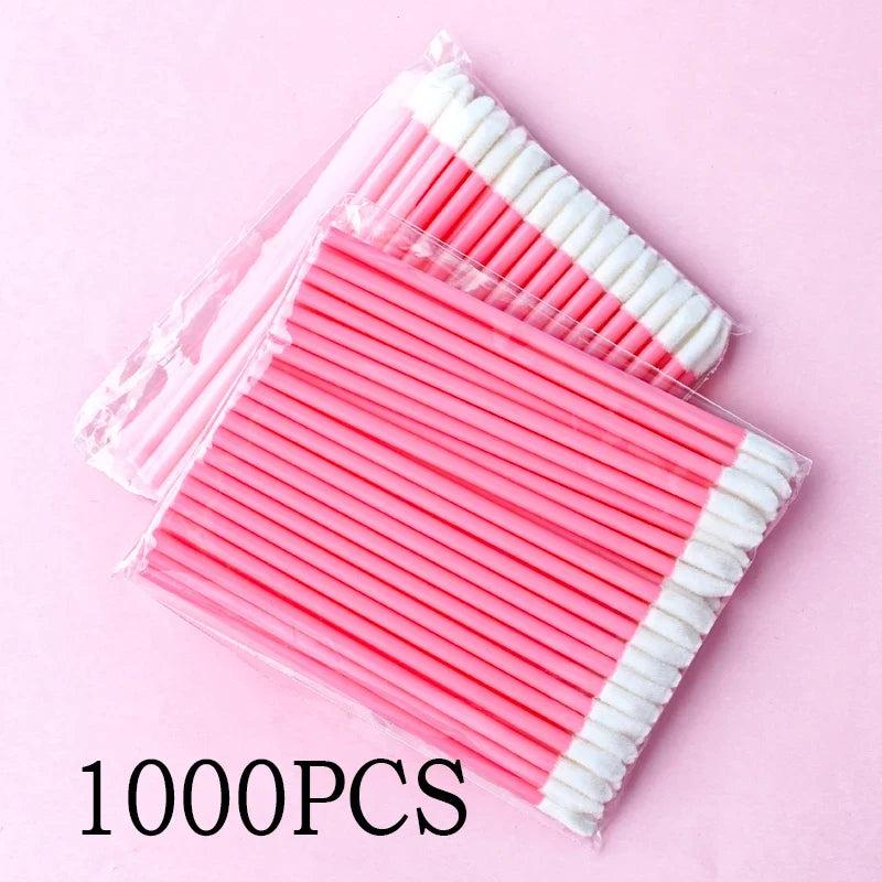 Set of wholesale Blushimmer lip brushes and eyelash applicator wands with pink handles and soft bristles for makeup application.