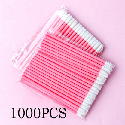 Set of wholesale Blushimmer lip brushes and eyelash applicator wands with pink handles and soft bristles for makeup application.