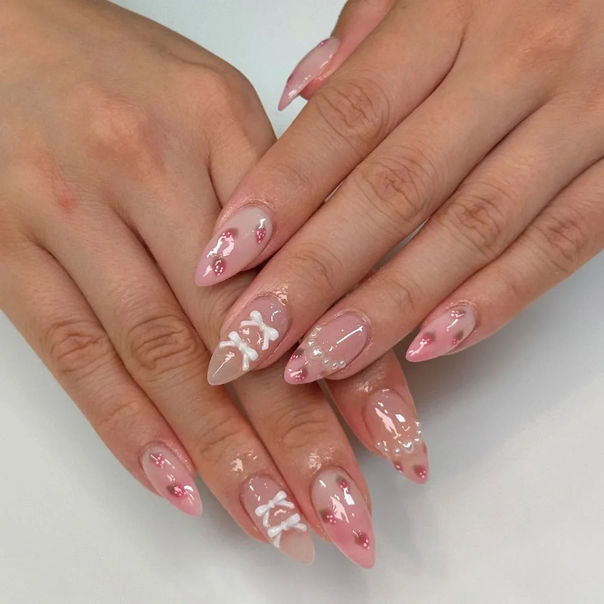 Set of 24 Blushimmer wine red almond press-on nails with cartoon rabbit, bowknot, plaid, pearl accents, and French style for girls