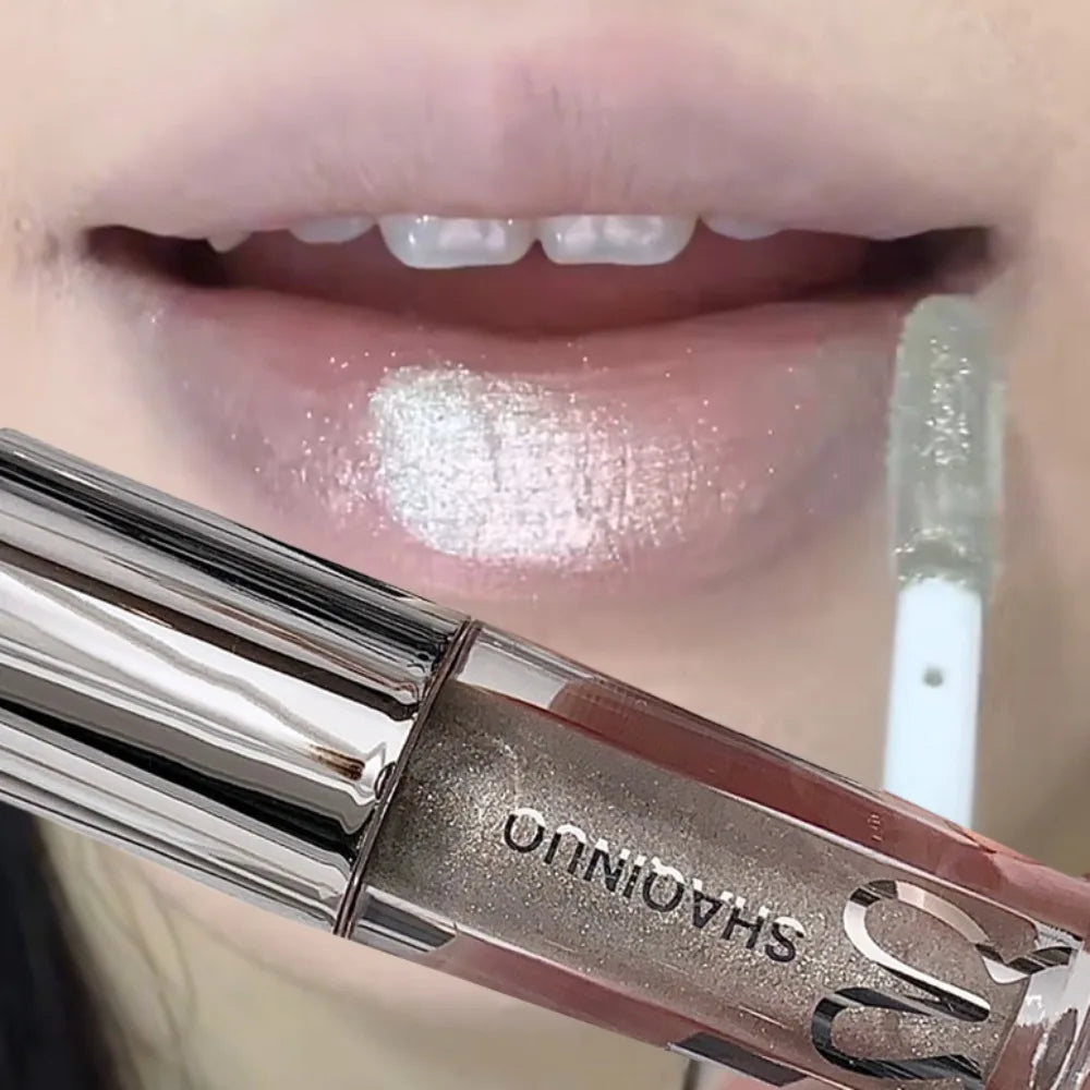 Black Rabbit Gothic silver metallic lip gloss by Blushimmer, featuring a translucent, non-sticky water gloss finish on lips.