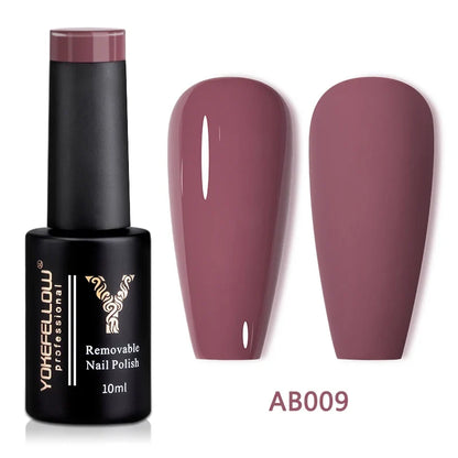 Blushimmer YOKEFELLOW 10ml translucent pink gel nail polish jar with applicator brush, showcasing the glossy, smooth finish.