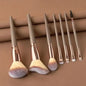Blushimmer makeup brush set with soft, fluffy brushes for foundation, powder, eyeshadow, and blending in a professional cosmetic kit.