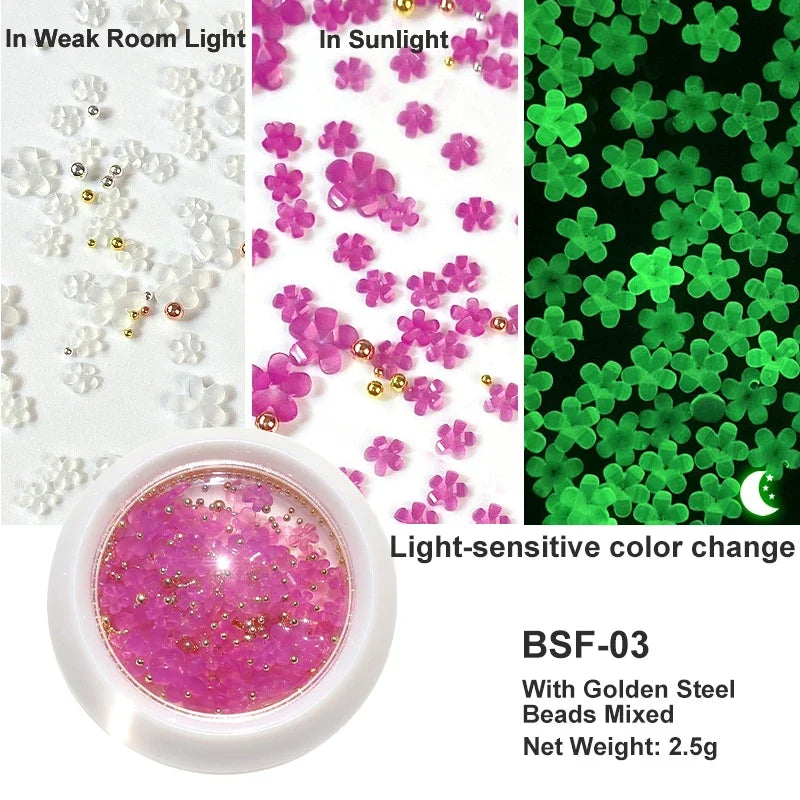 White acrylic flower nail art decorations with mixed size rhinestones, red and blue gems for manicure DIY nail design accessories.