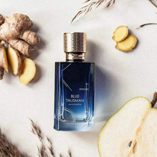 Blushimmer 100ml luxury unisex cologne with blue floral protective talisman design, featuring long-lasting woody floral fragrance.