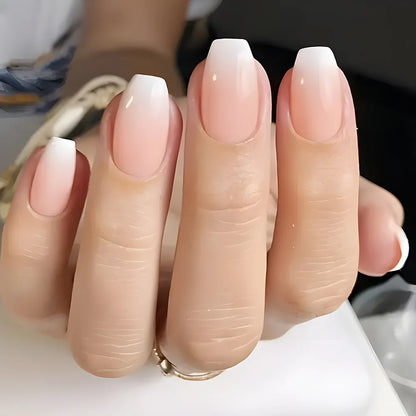 Set of 24 pink and white gradient square head fake nail tips with French press design, from Blushimmer, with jelly glue included.