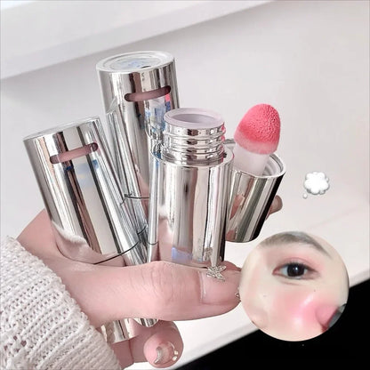 Blushimmer Vitality Liquid Blush & Lip Tint in a clear bottle, showing a moisturizing water glow for lips and cheeks, easy to blend, unisex.