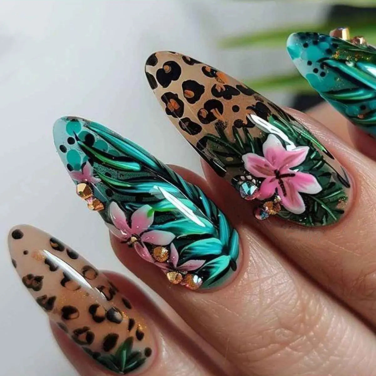 Set of 24 glossy almond false nails by Blushimmer with dark green forest and mushroom pattern, gold sequins, French style design.