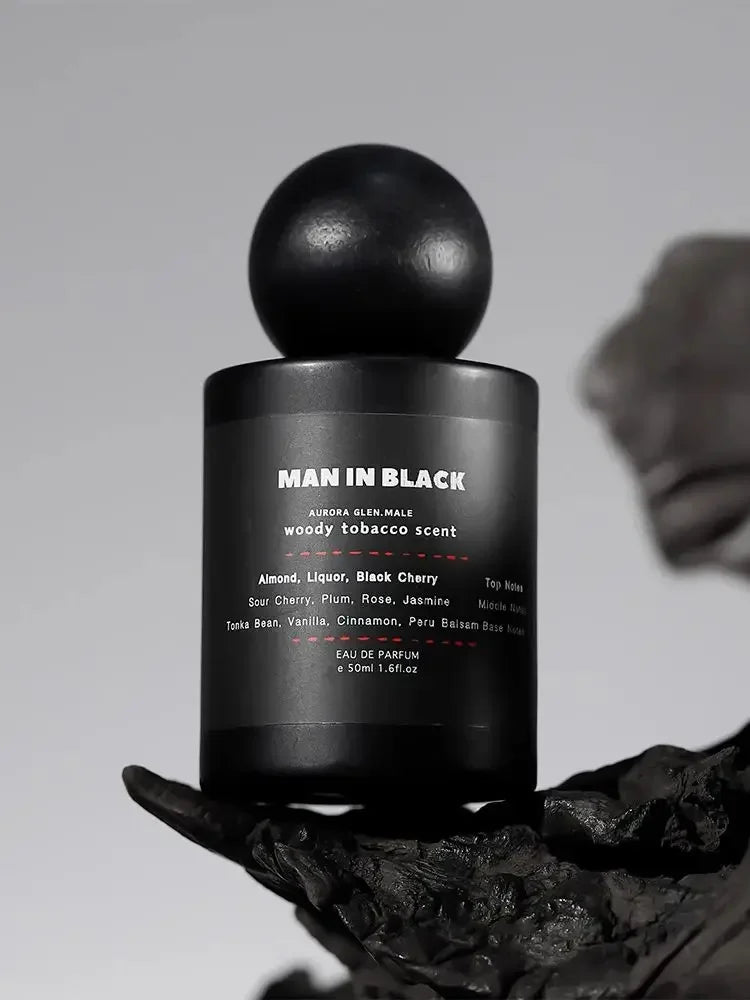 Blushimmer Guilty Black pheromone perfume cologne for men and women with fresh woody sandalwood scent, light fragrance, sleek bottle