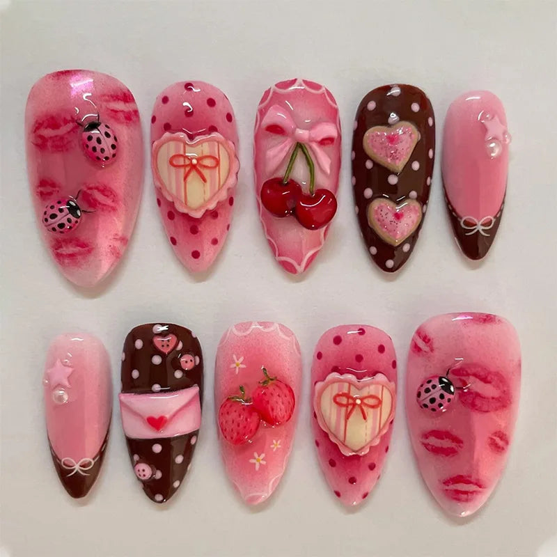 Set of 24 Blushimmer wine red almond press-on nails with cartoon rabbit, bowknot, plaid, pearl, and French nail designs for girls.