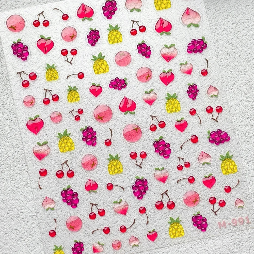 Close-up of cute red cherry bowknot 5D nail art stickers with shiny rhinestones, perfect for DIY manicure decoration.