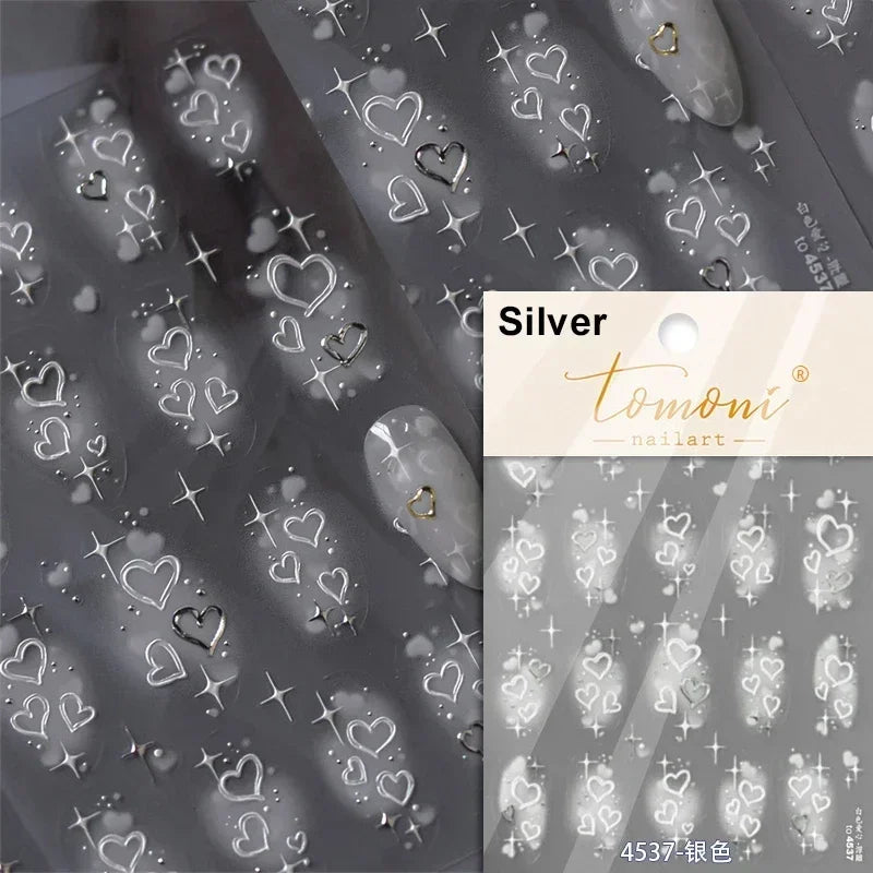 Colorful Cat's Eye 5D gradient European love heart gem nail art stickers with wing and geometric shapes for manicure decoration.