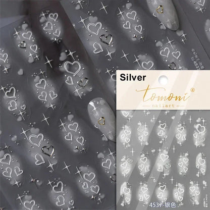 Colorful Cat's Eye 5D gradient European love heart gem nail art stickers with wing and geometric shapes for manicure decoration.