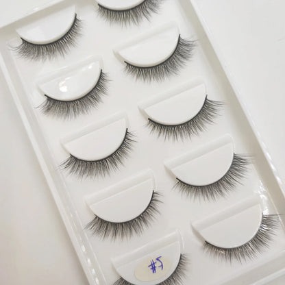 Set of 5 pairs of natural 3D mink false eyelashes by Blushimmer, showcasing fluffy, voluminous eyelash extensions for makeup.