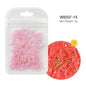 White acrylic flower nail art decorations with mixed size rhinestones and colorful gems for DIY manicure designs by Blushimmer.