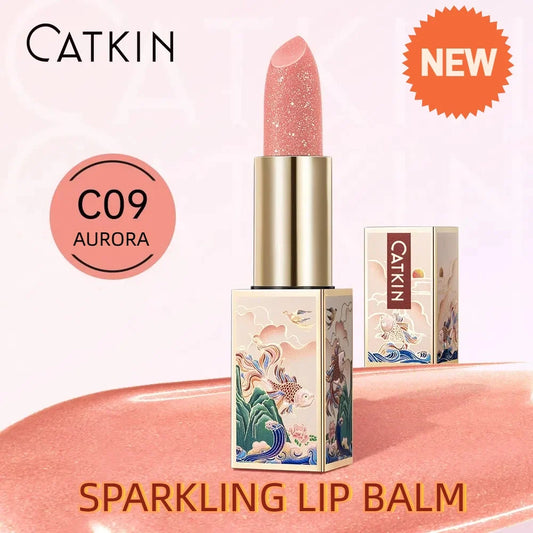 Blushimmer Catkin Sparkling Lip Balm in Moonlight, a color-changing lip stick with a shimmering, luminous finish.