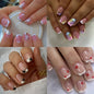 Set of 24 short square fake nails by Blushimmer with halo dyed gradient hearts and colorful French nail designs.