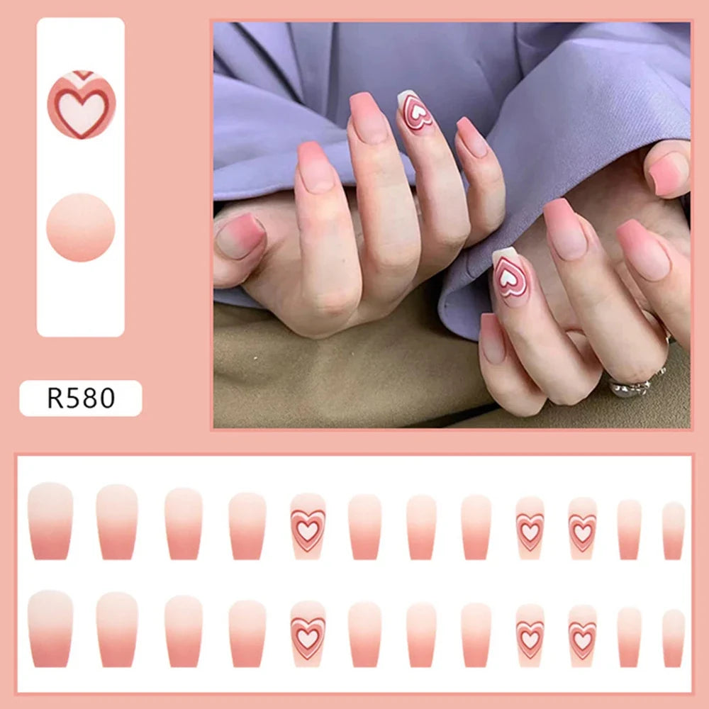 Set of 24 Y2K star press-on nails by Blushimmer with gradient black moon designs, mid-length coffin false nail tips for a stylish look