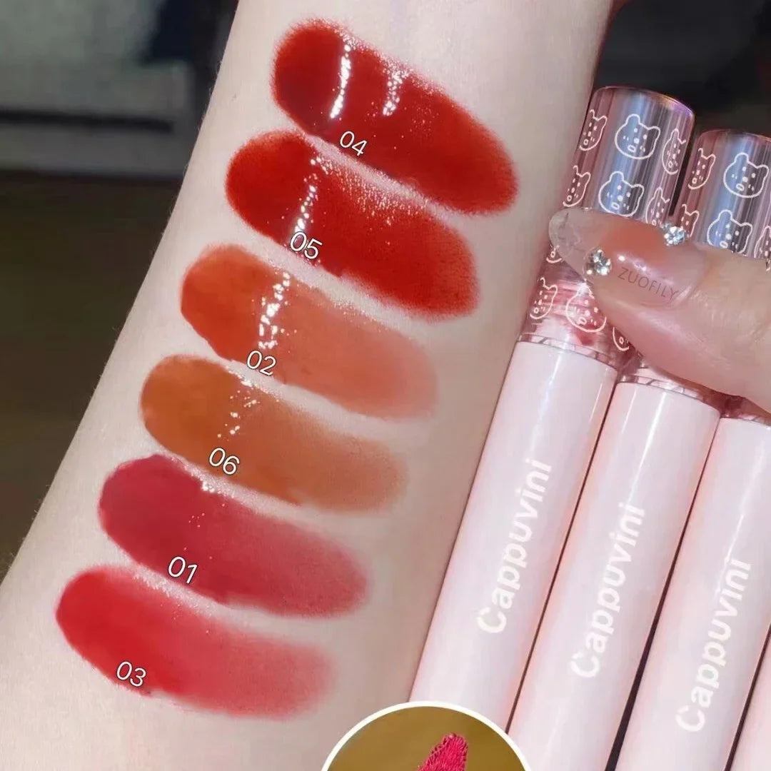 Cherry Pink Mirror Water Lip Gloss by Blushimmer, moisturizing glass lip oil with a shiny cherry pink finish.