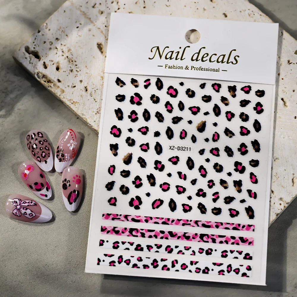 Pink leopard print nail art stickers by Blushimmer, 8x10cm sheet with black and brown leopard designs for DIY manicures.