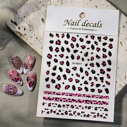 Pink leopard print nail art stickers by Blushimmer, 8x10cm sheet with black and brown leopard designs for DIY manicures.