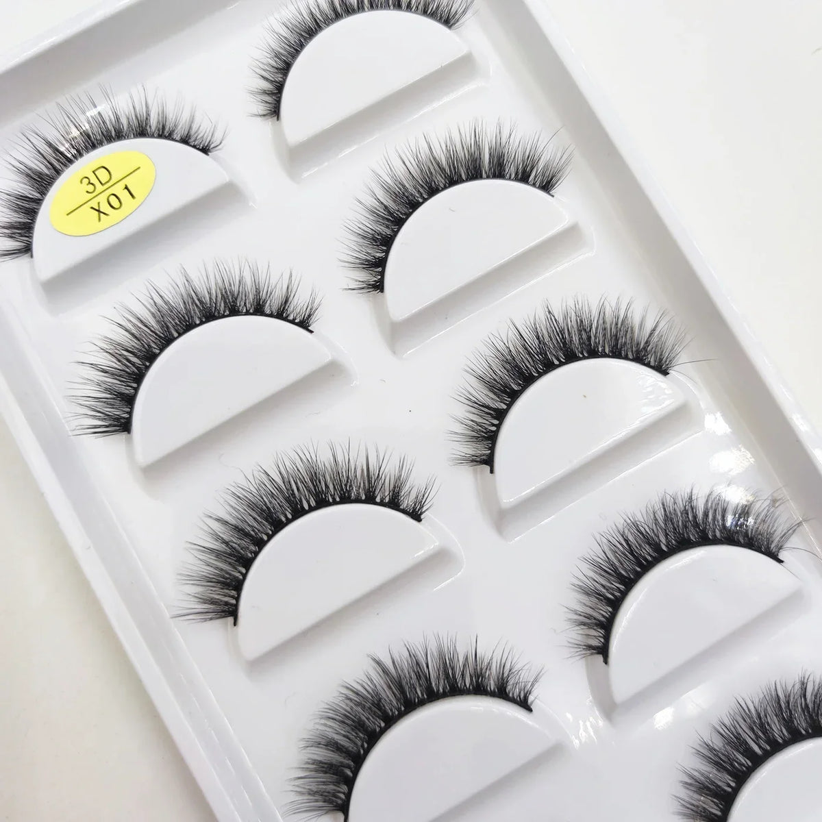 Set of five pairs of natural 3D mink false eyelashes by Blushimmer, ideal for makeup and beauty enhancements.