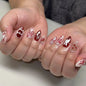 Blushimmer 24-piece wine red almond press-on nails featuring cartoon rabbit, bowknot, plaid, pearl designs, and French style.