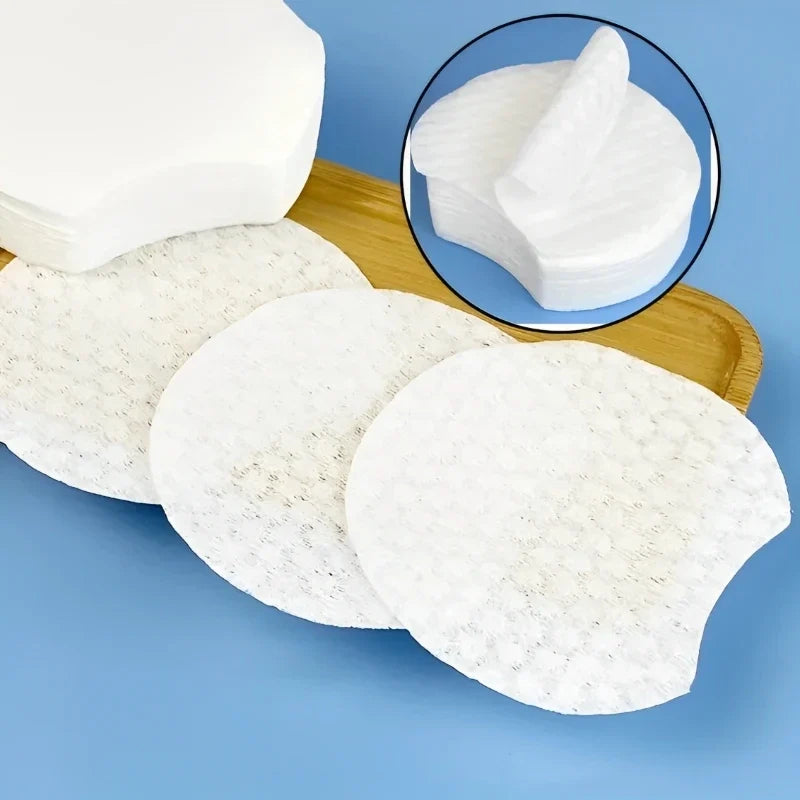 Disposable makeup cotton pads by Blushimmer, soft pearl notched design facial wipes for gentle cleansing and makeup removal.