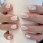 Set of 24 Blushimmer short square fake nail tips with pink and white gradient French press design and jelly glue included.