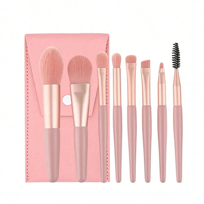 Set of 13 Blushimmer makeup brushes for eyeshadow, foundation, and blush in a soft cosmetic brush collection with a storage bag
