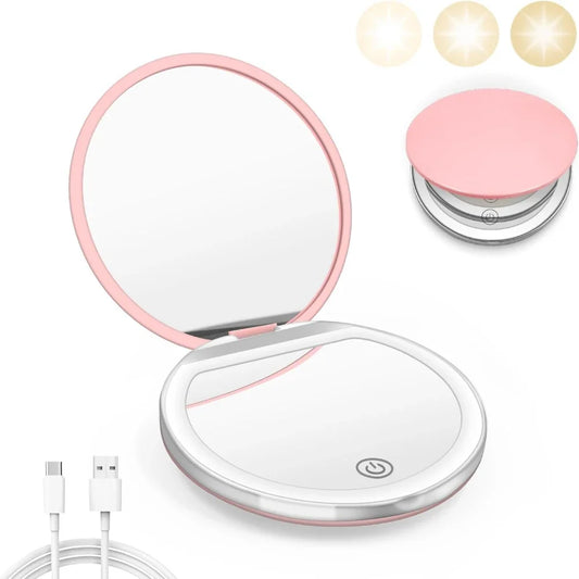 Pink compact LED pocket mirror with 1X/3X magnification, illuminated surface, USB cable, suitable for purse, travel, or on-the-go.