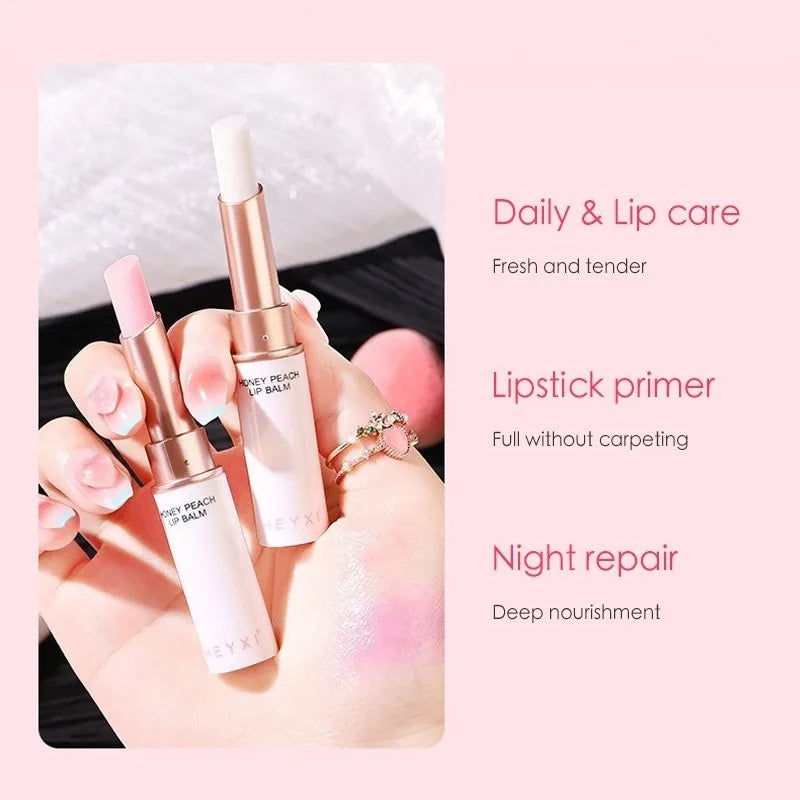 Blushimmer honey peach lip balm with color-changing, moisturizing, and nourishing formula on smooth lips.