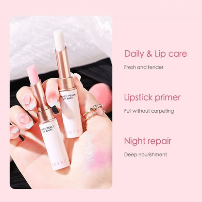 Blushimmer honey peach lip balm with color-changing, moisturizing, and nourishing formula on smooth lips.
