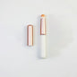 Blushimmer portable gold and silver lipstick makeup brush pen with metal handle and protective cap for lip gloss application.