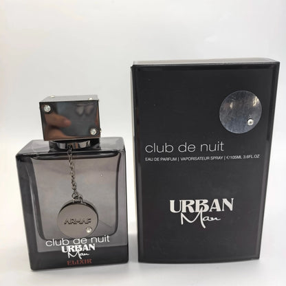 Armaf Club De Nuit Urban Man Elixir EDP 105ml bottle with bold woody amber scent, unisex perfume, ideal holiday gift