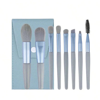 Set of 13 Blushimmer makeup brushes including eyeshadow, foundation, and blush brushes in a soft makeup tools bag.