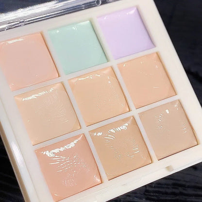 Blushimmer 9-color concealer palette with shades for covering freckles, acne scars, dark circles, and brightening skin tone.