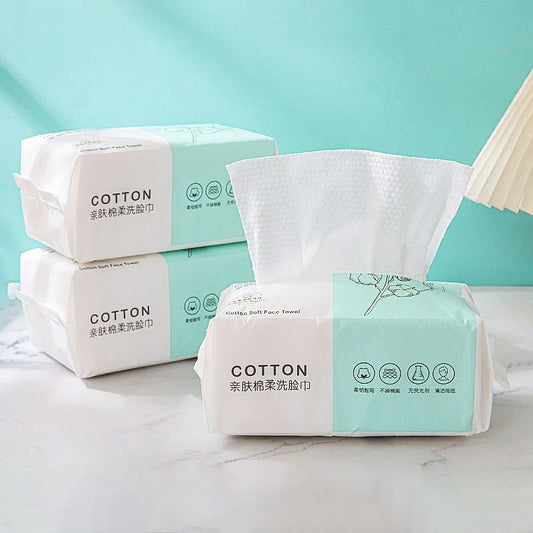 Set of 100 Blushimmer natural disposable face towels for travel, soft makeup remover, and facial cleansing in nonwoven pearl cotton fabric.